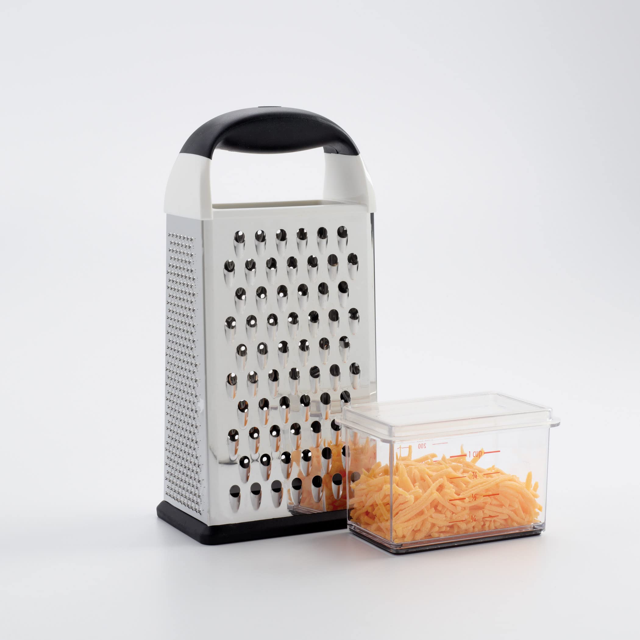 OXO Good Grips grating cheddar directly into container for mess-free preparation