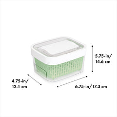 OXO Good Grips in use inside fridge with berries, demonstrates space saving and visibility