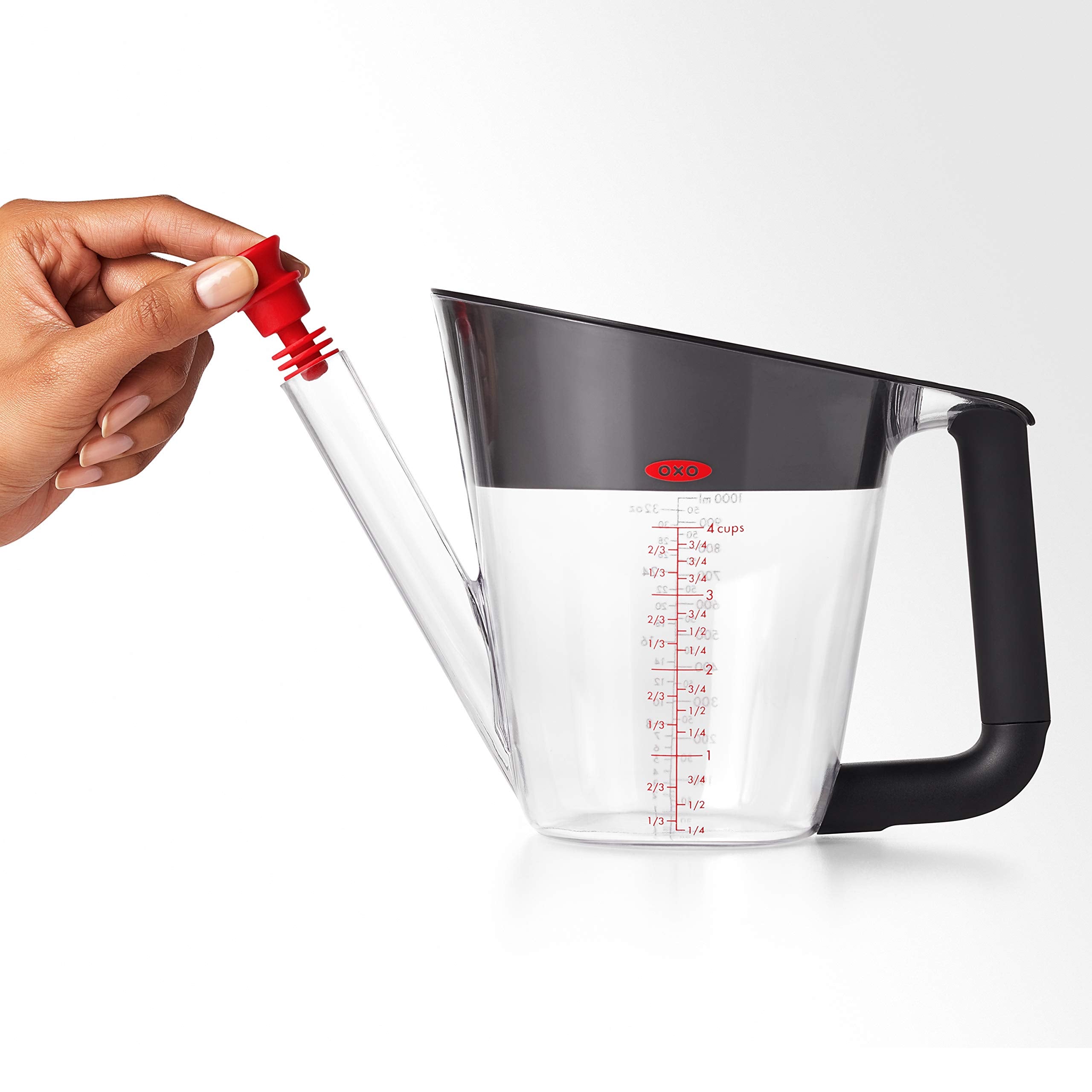 OXO Good Grips beside a coffee mug to show 4-cup capacity