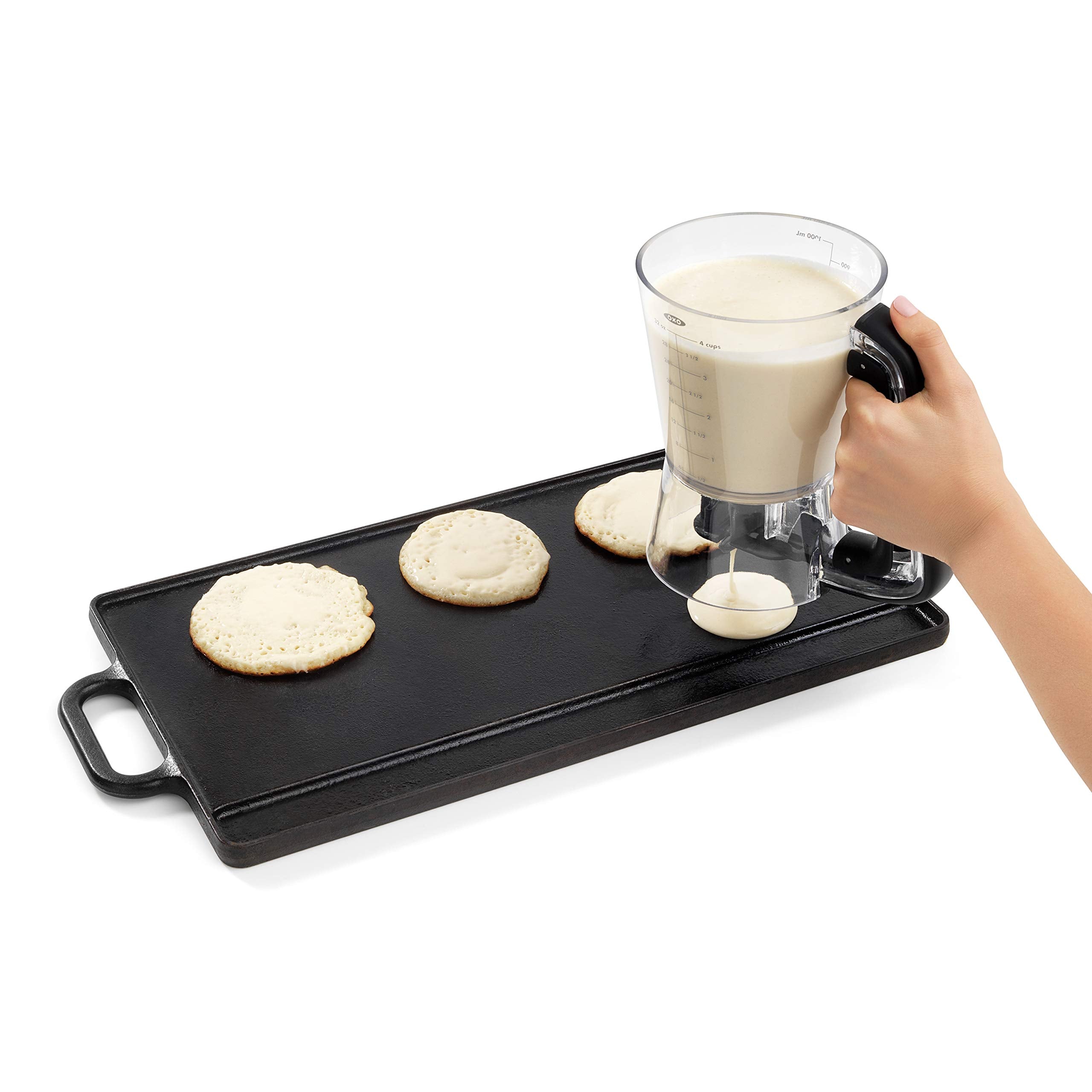 OXO Good Grips lid used as drip tray catching excess batter between pours