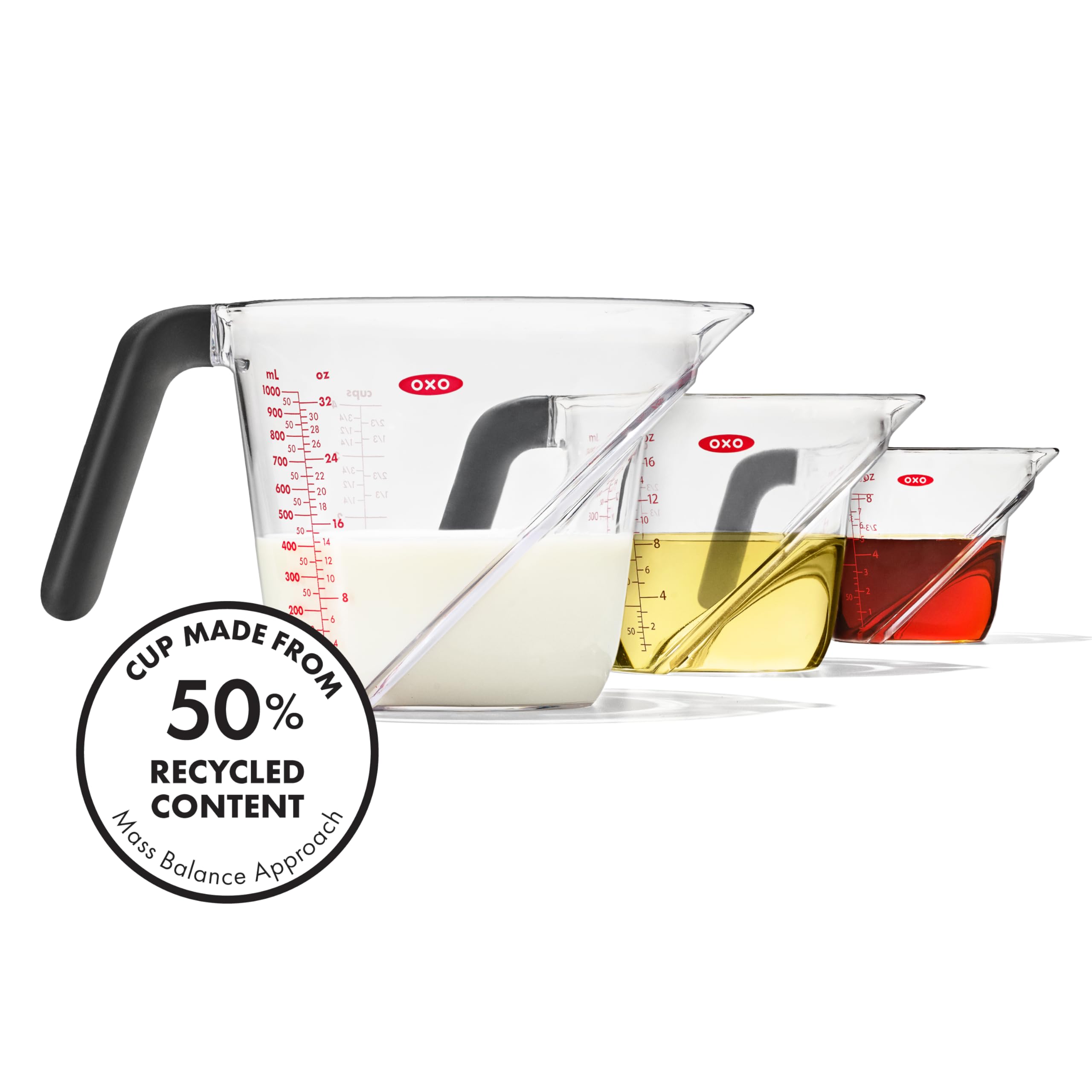 OXO cups side-by-side with fruit showing scale and quick size choice