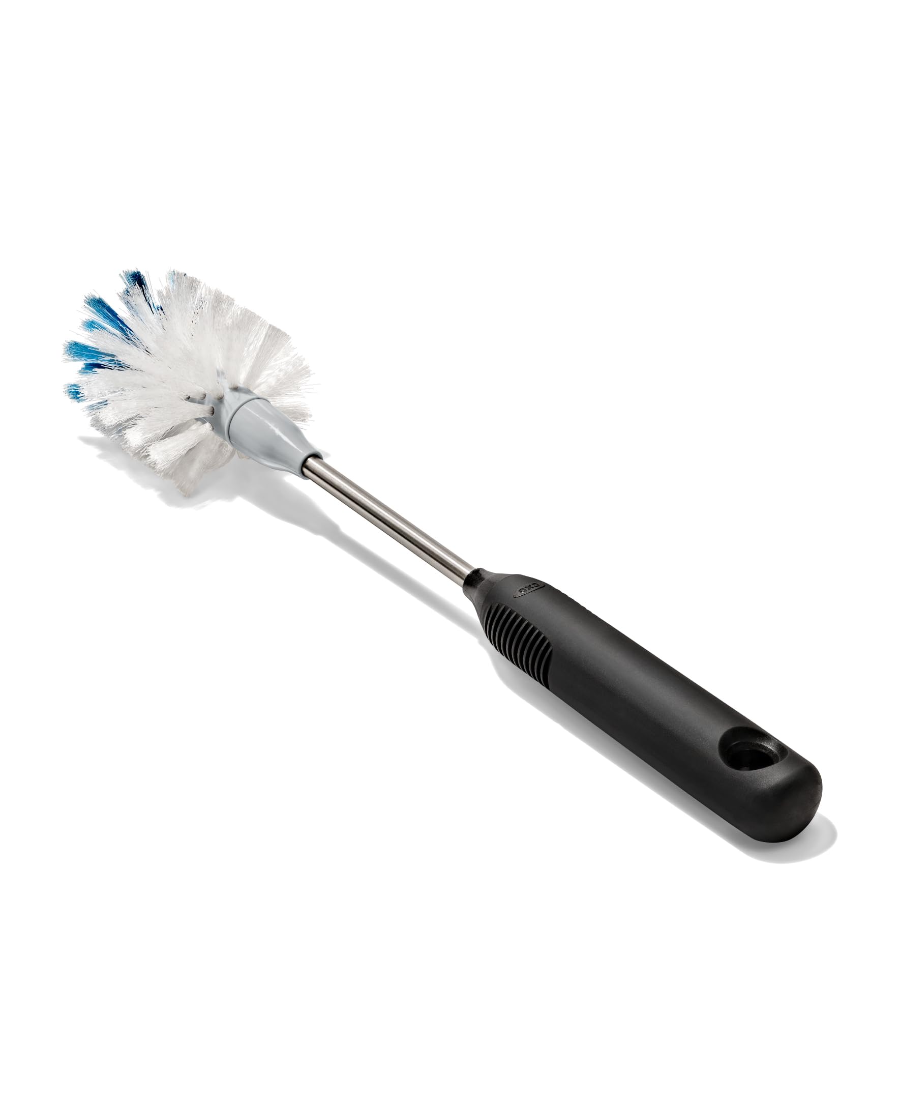 OXO product packaging and label highlighting replaceable head compatibility and features