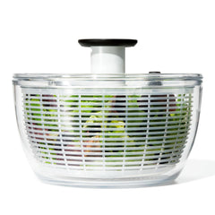 OXO front view of salad spinner showing clear bowl and lid, quick prep benefit