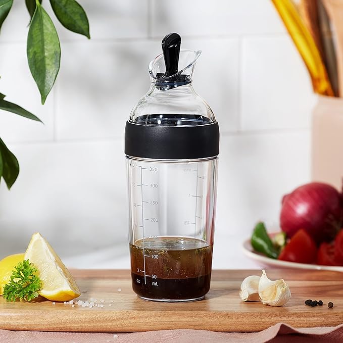 OXO shaker stored in refrigerator showing airtight seal and space-saving size for meal prep