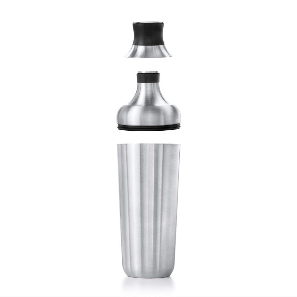 OXO shaker held in hand demonstrating 24 oz capacity and size reference