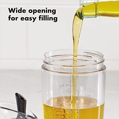 OXO shaker closeup of flip lever pour mechanism for one-handed controlled serving