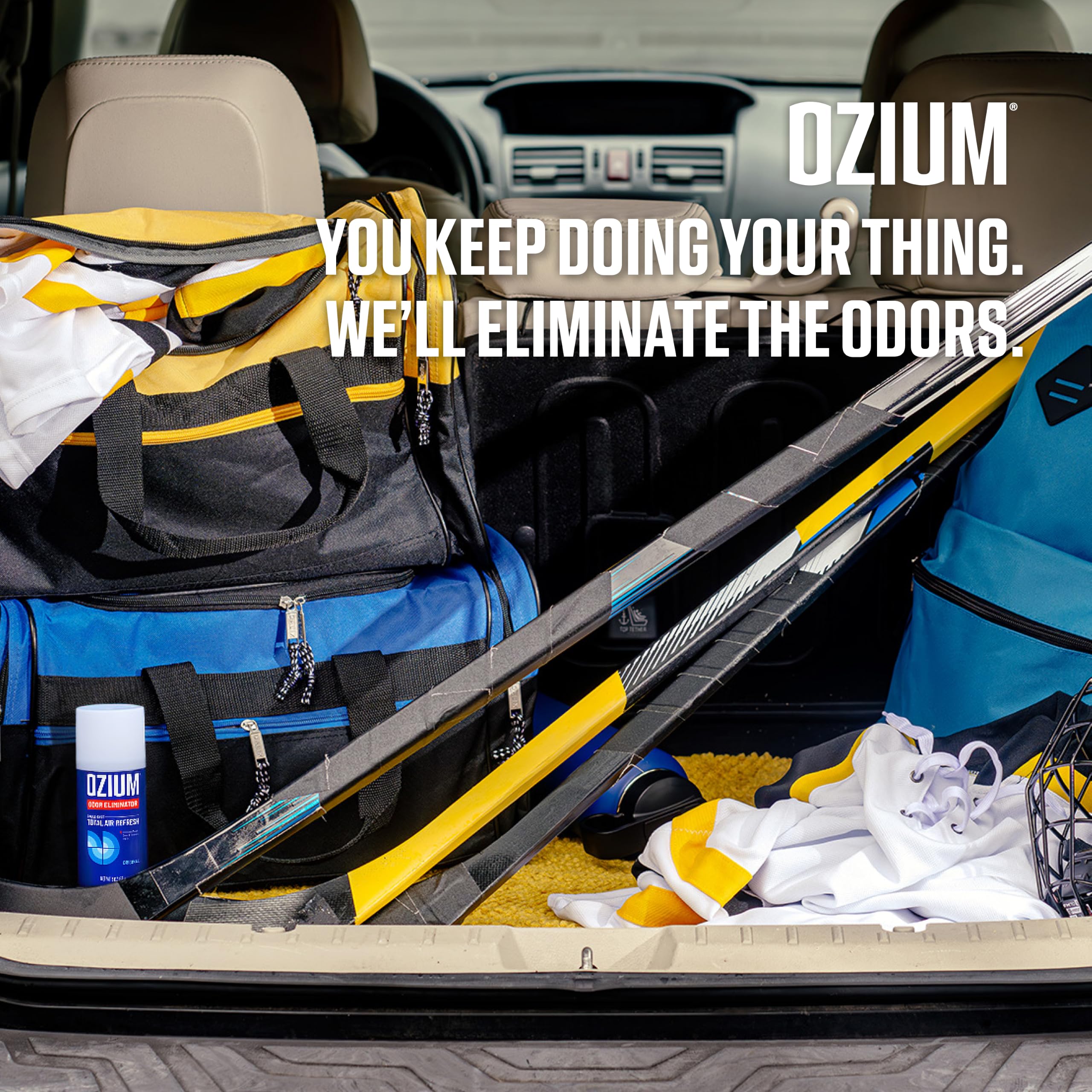 ozium car fogger in use inside sedan cabin improving air quality quickly