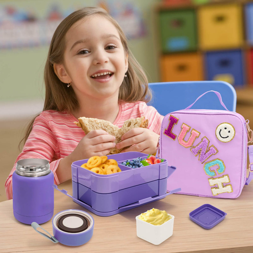 PainZieteg bento box open to reveal six compartments for organized portions and snacks