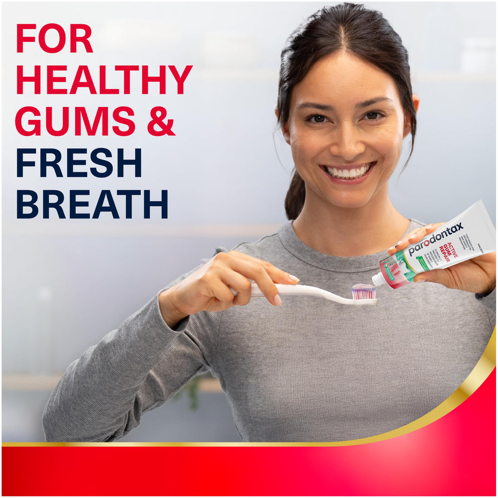 Person brushing with Parodontax in bathroom showing routine use for gum care benefit