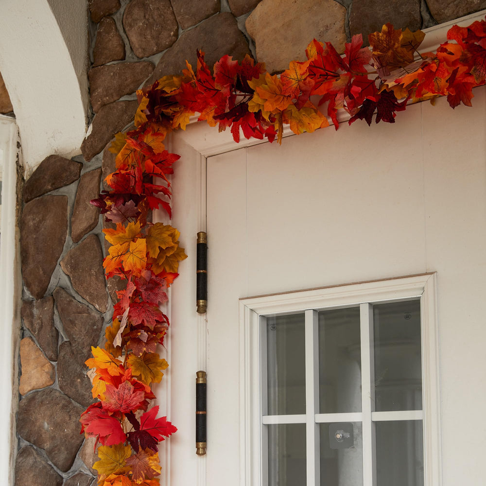 Party Joy garlands hung on covered porch illustrating outdoor staging without heavy weather exposure