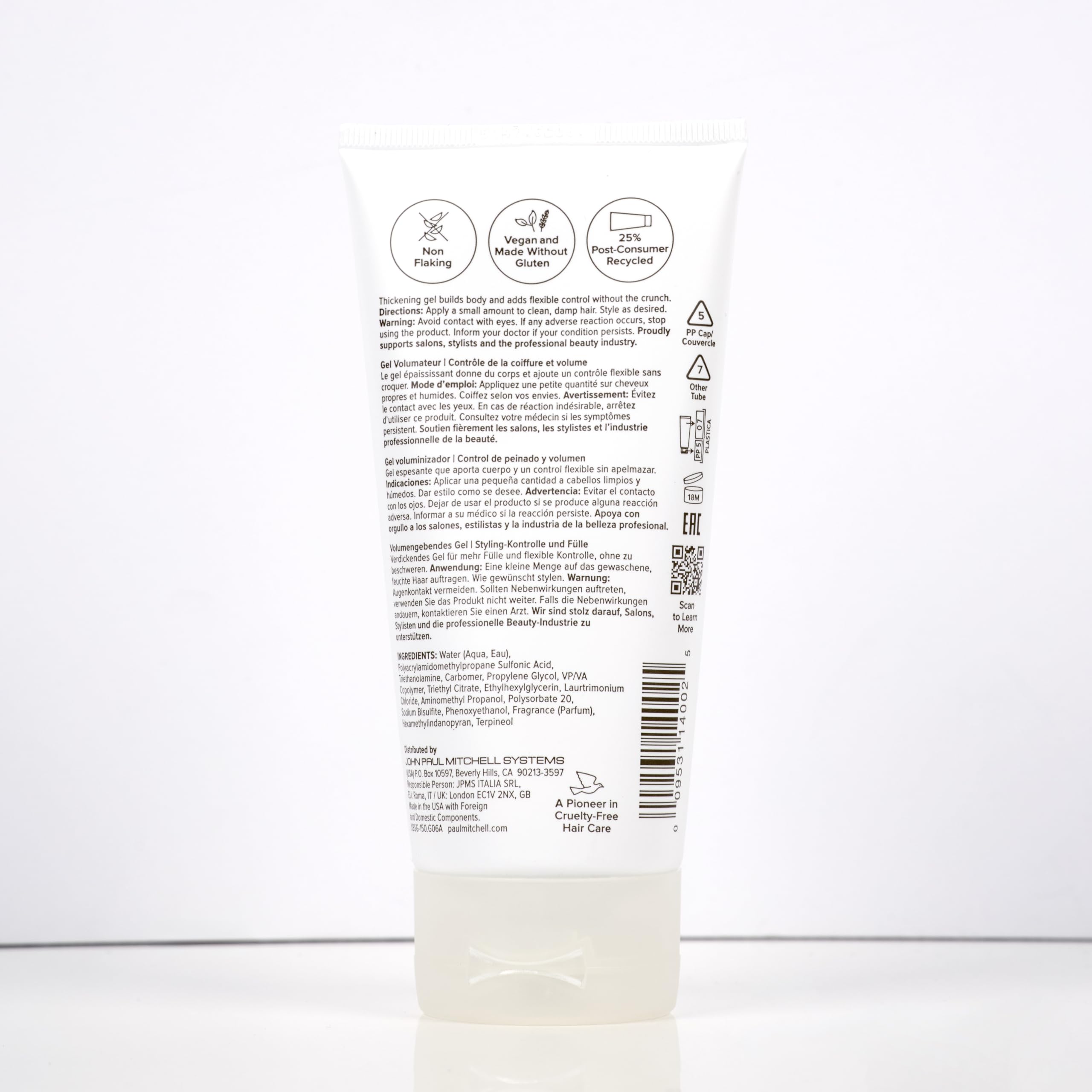 Paul Mitchell finished brushed-out hairstyle demonstrating soft, full-bodied volume