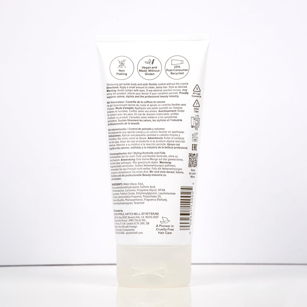 Paul Mitchell finished brushed-out hairstyle demonstrating soft, full-bodied volume