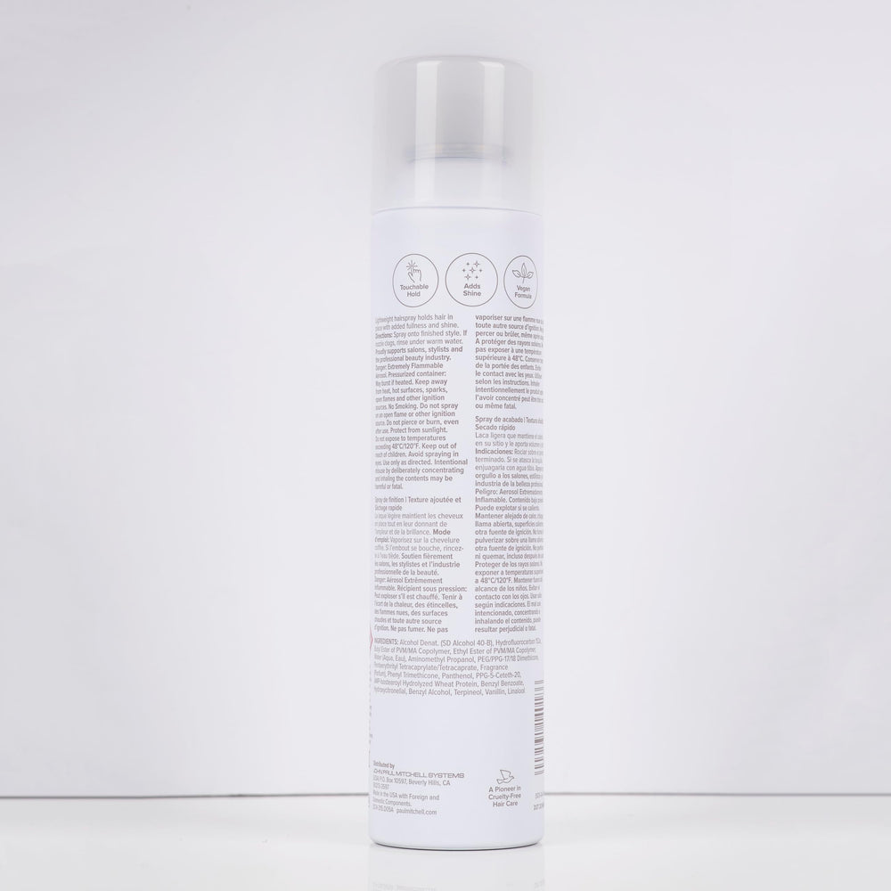 Paul Mitchell on bathroom vanity lifestyle shot suggesting salon-quality at-home benefit