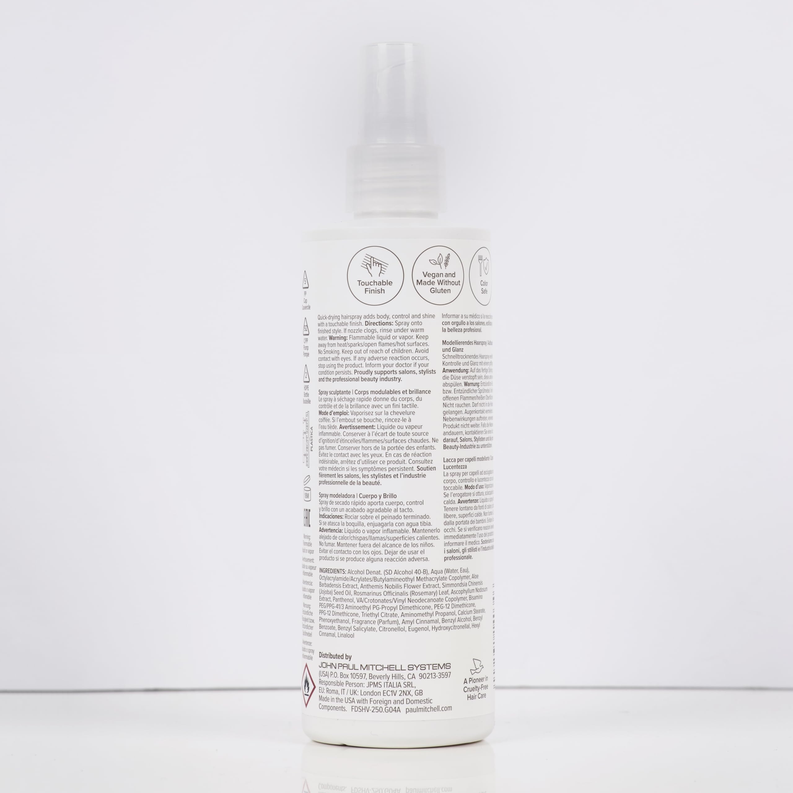 Paul Mitchell in a beauty bag beside a mirror for on-the-go restyling