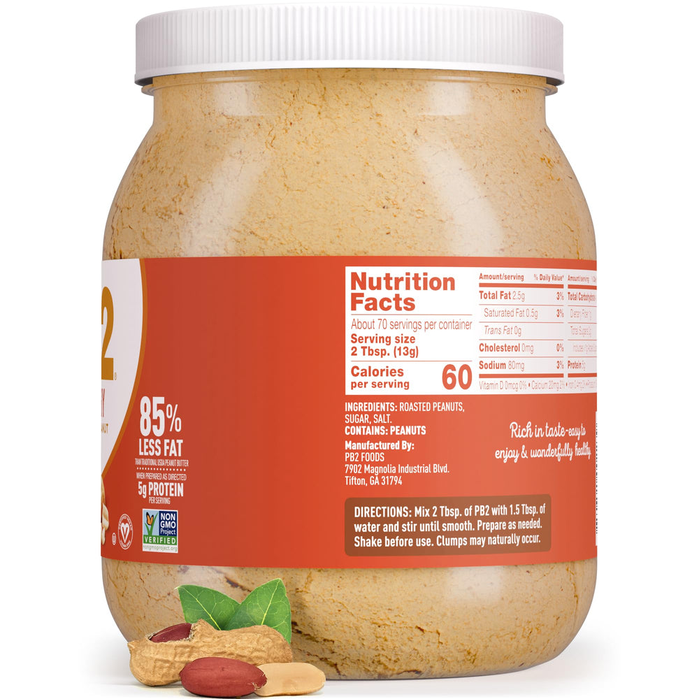 Spoonful of PB2 beside measuring scale illustrating precise portion control