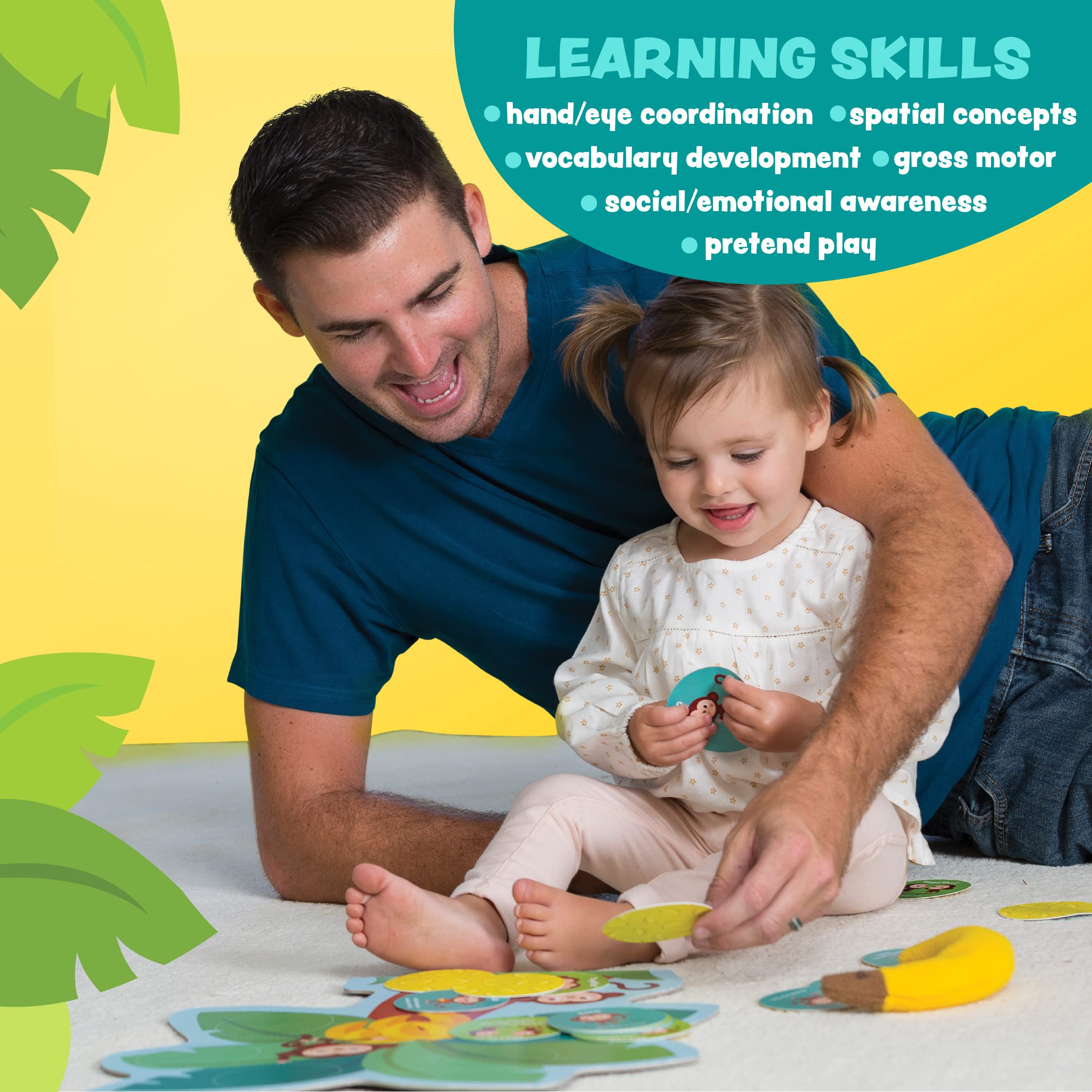 Peaceable Kingdom toddler catching the banana with adult nearby to promote catching practice