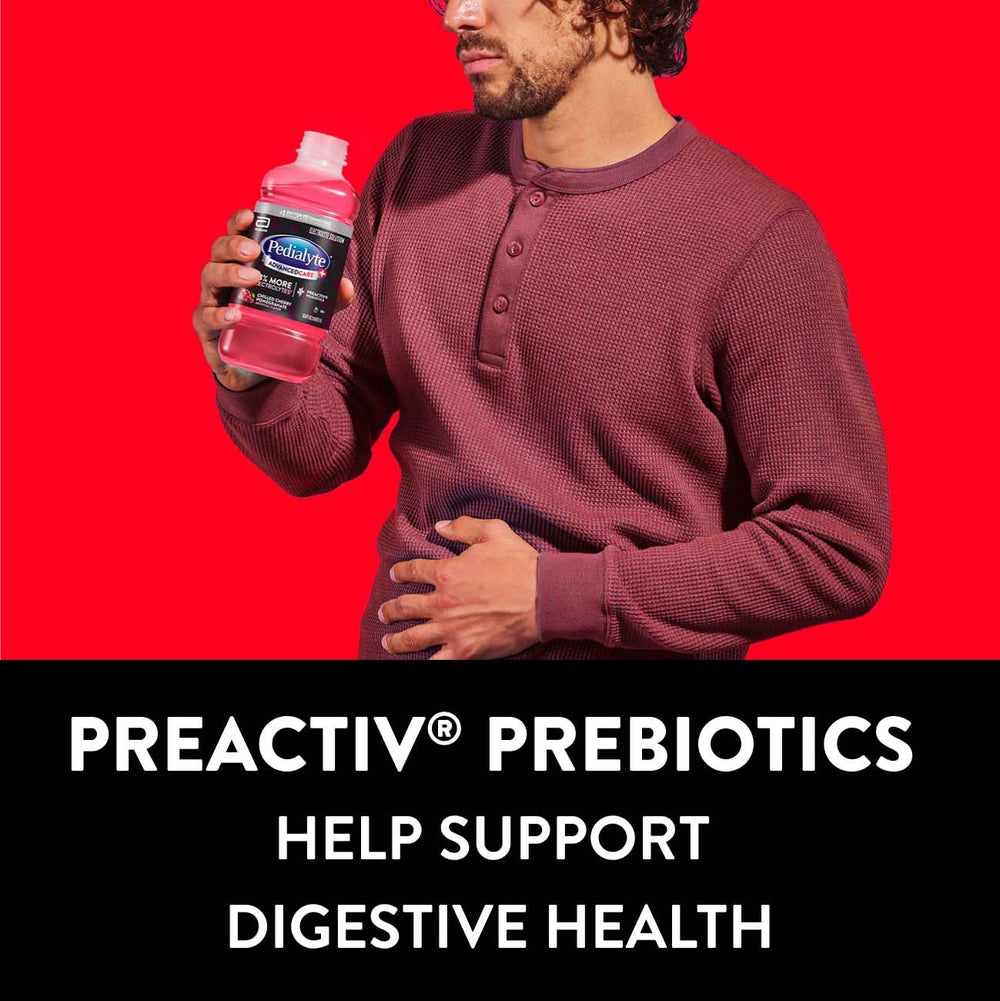 Pedialyte beside a standard water bottle to show size and portability for travel and convenience
