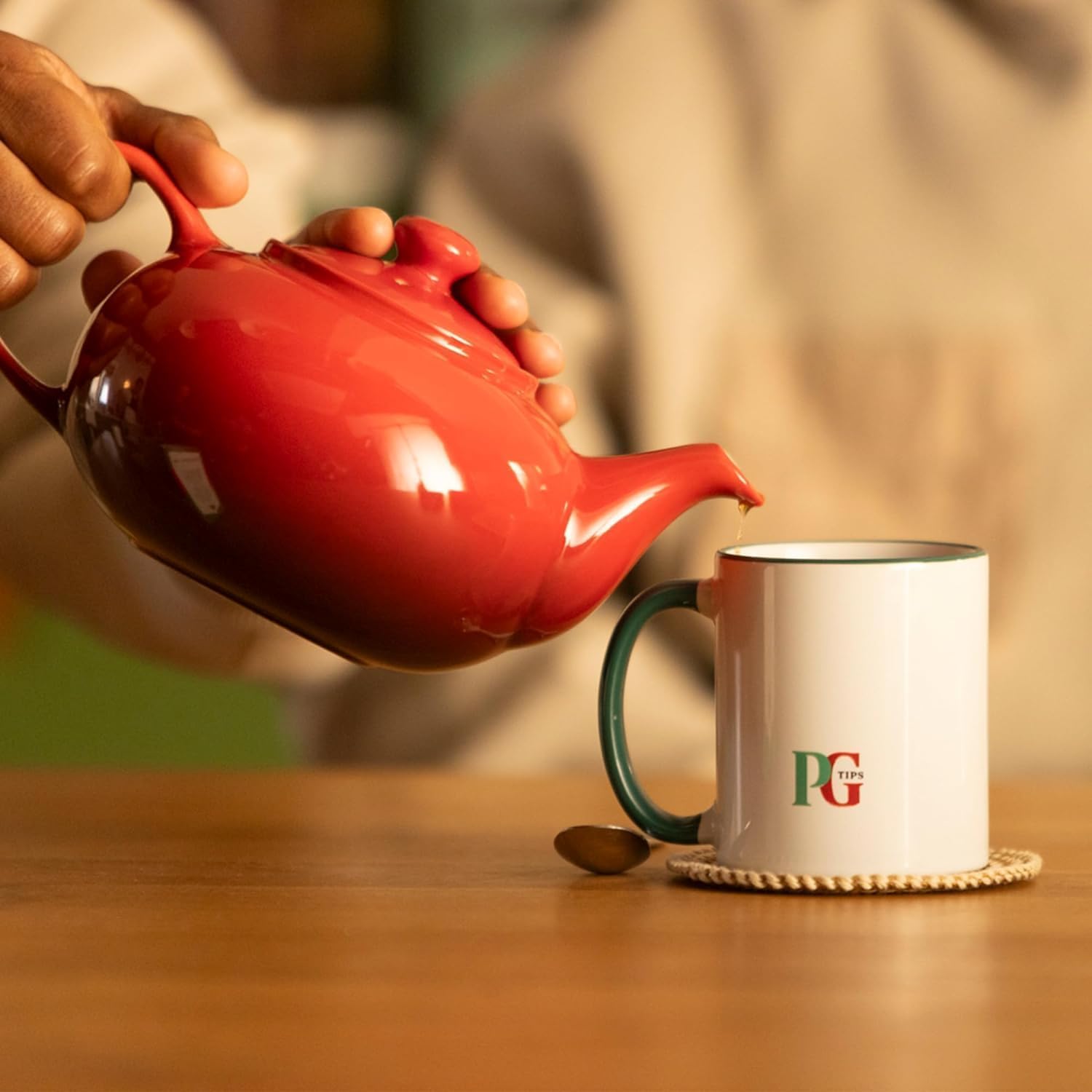 PG Tips boxes stored on kitchen shelf, emphasizes bulk convenience for households