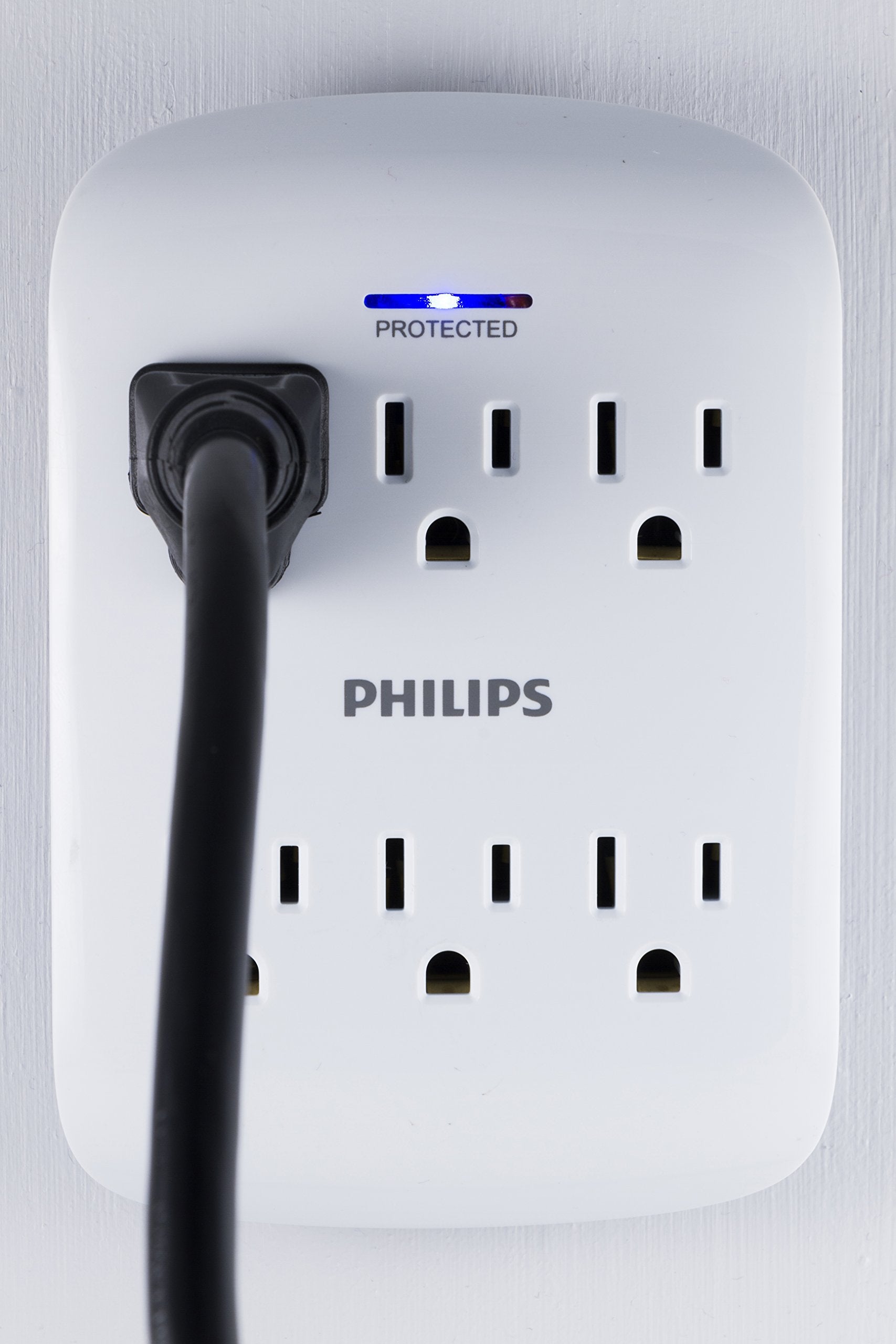 Philips LED protection indicator close-up showing active surge status