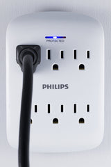 Philips LED protection indicator close-up showing active surge status