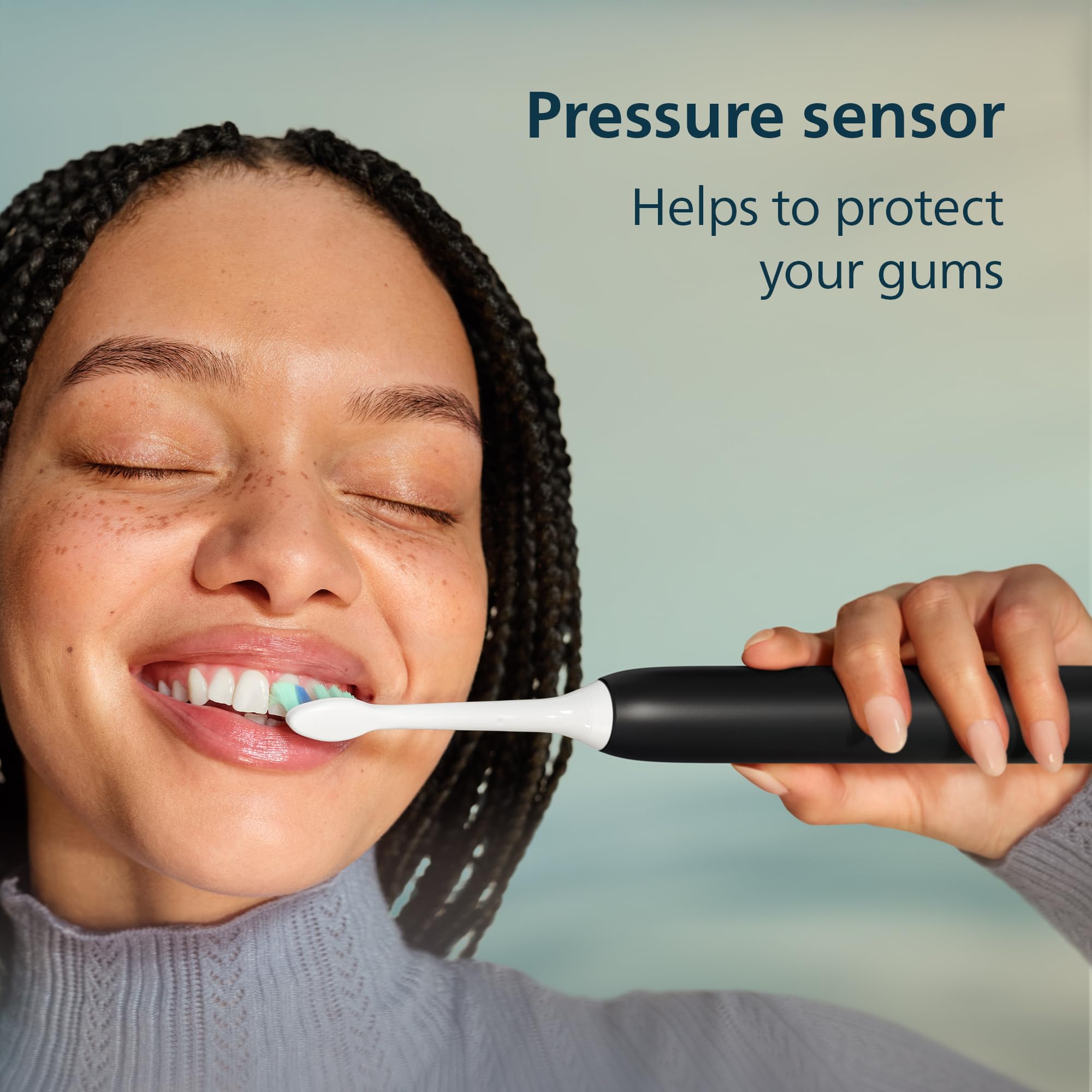 Philips Sonicare 4100 with charger showing charging base and illuminated battery icon