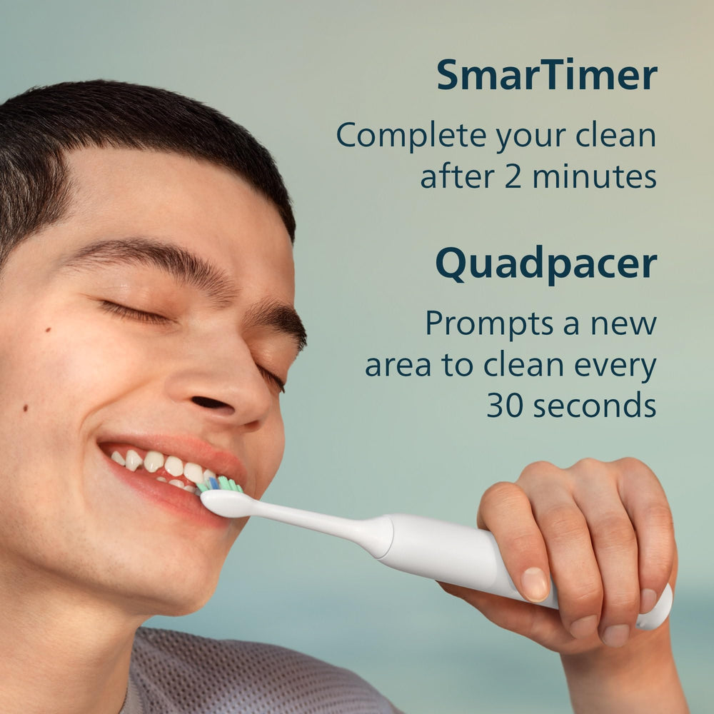 Philips Sonicare 4100 next to toothpaste for scale and compact bathroom storage
