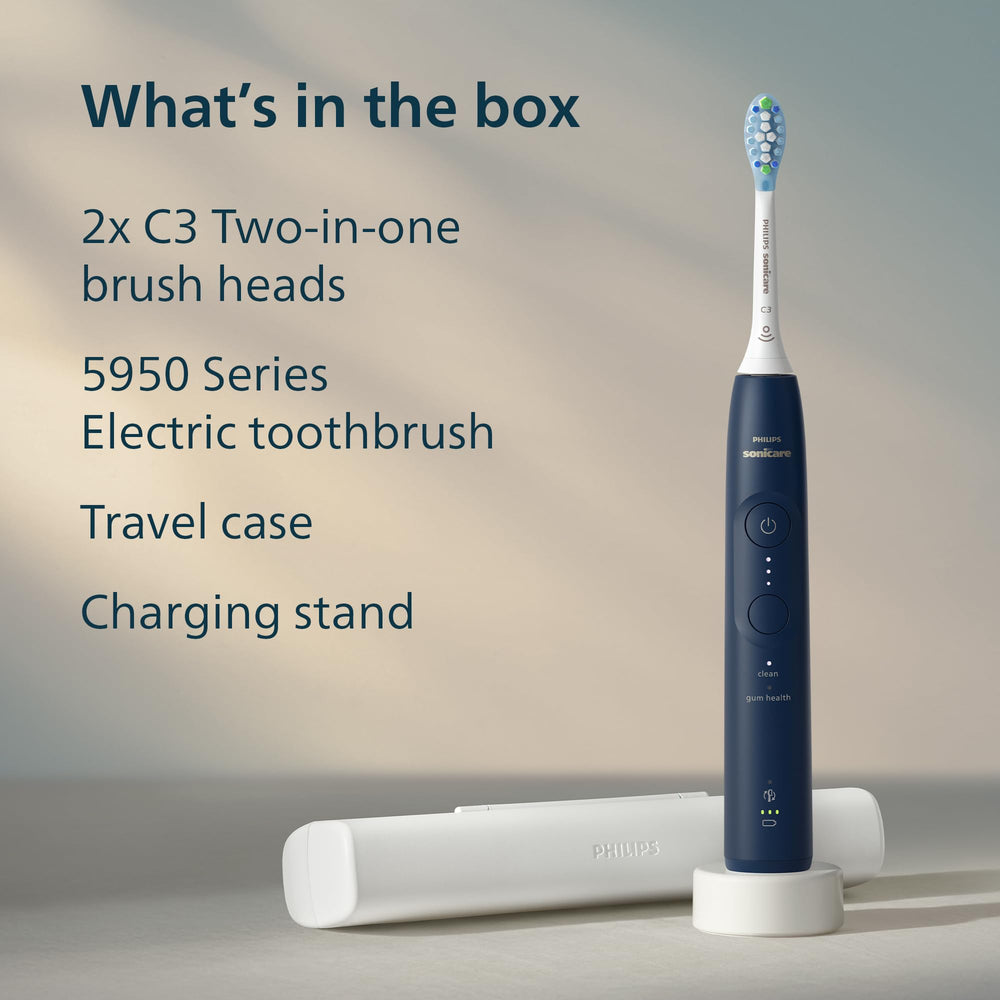 Philips Sonicare 5950 flatlay with handle, brush heads, case, and charger displayed