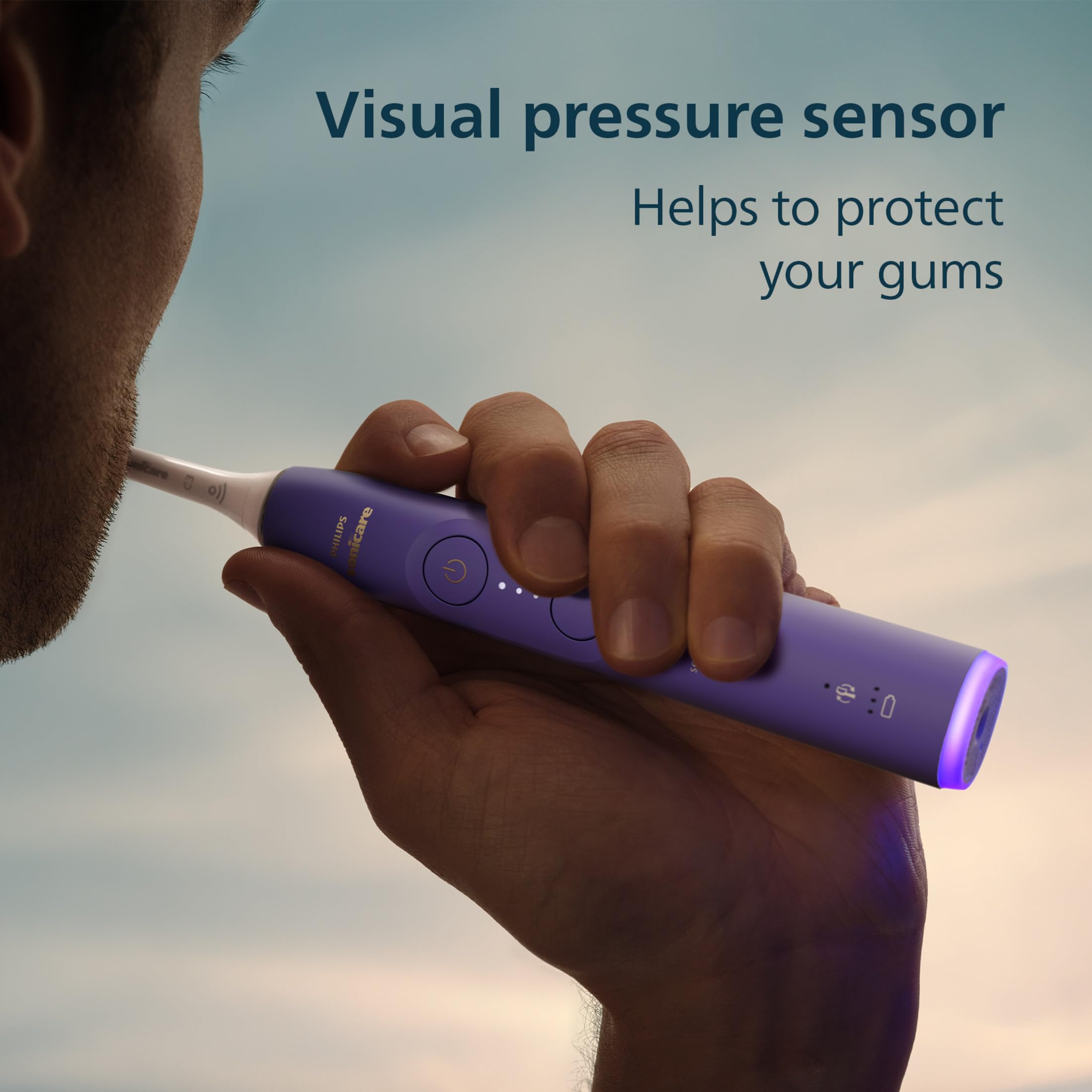 Philips Sonicare in use demonstrating gentle effective clean along gumline for improved oral care