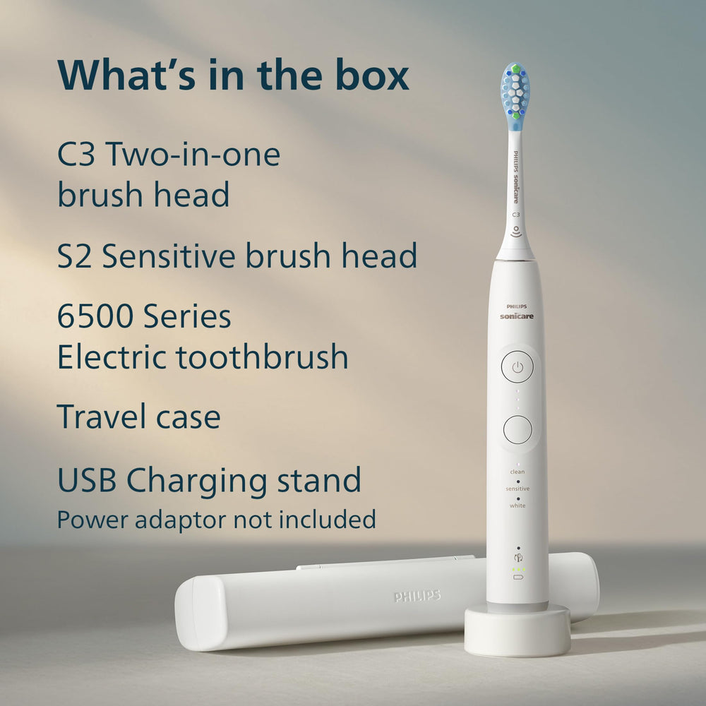Philips Sonicare next to toothpaste showing scale and travel convenience