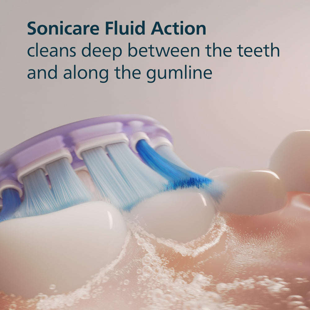 Philips Sonicare brush head next to toothbrush for scale and sizing clarity