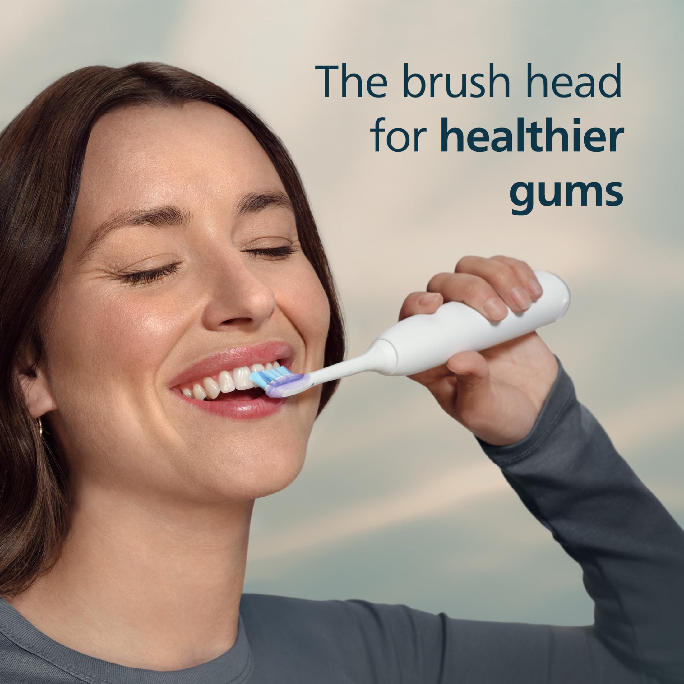 Philips Sonicare side profile showing concave bristle shape for targeted gum care