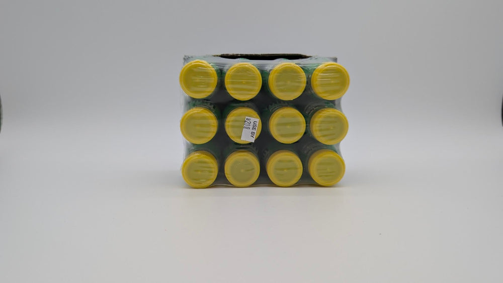 Pickle Juice bottle on bedside table illustrating nighttime cramp support