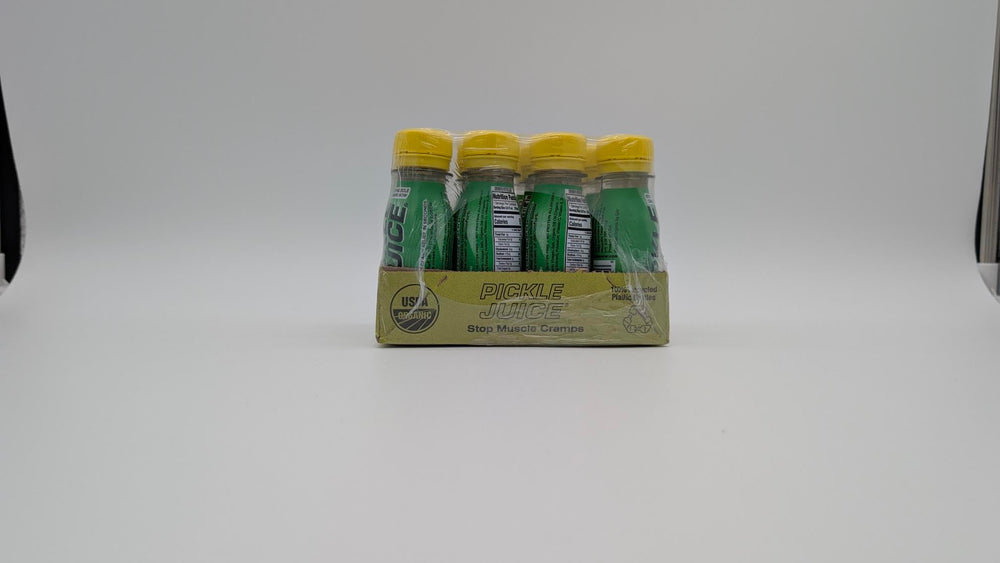 Pickle Juice bottle next to measuring scale conveying single-serve convenience