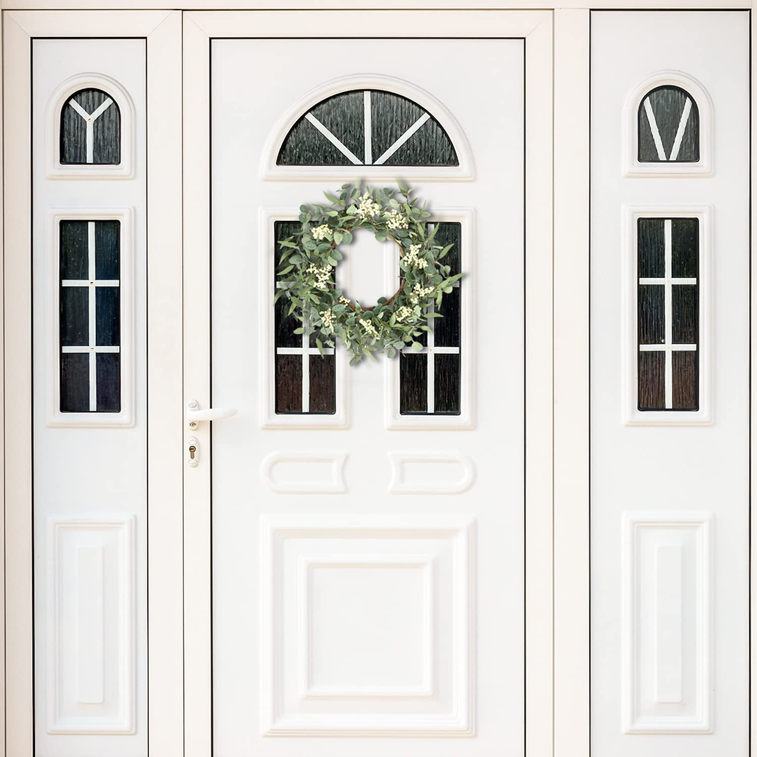 pinkpum wreath styled on a wedding arch demonstrating customizable event décor