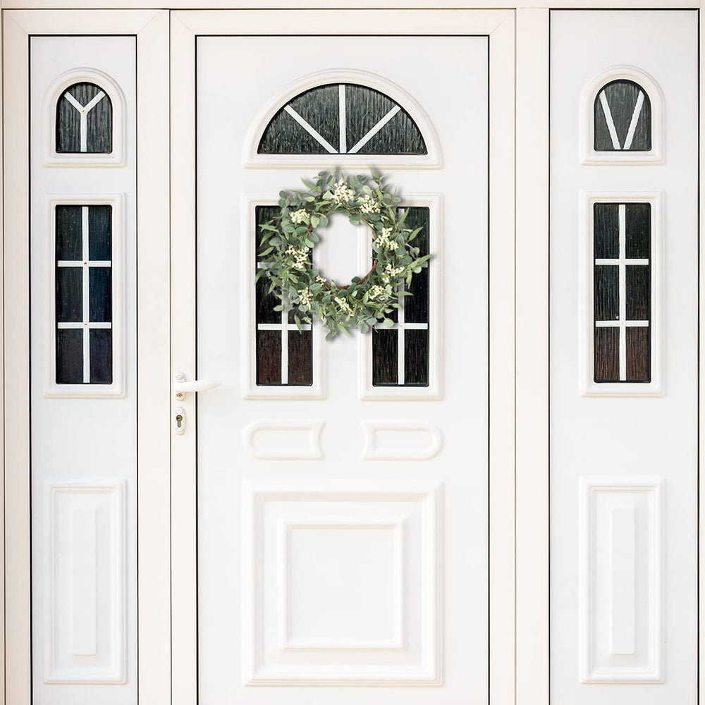 pinkpum wreath styled on a wedding arch demonstrating customizable event décor