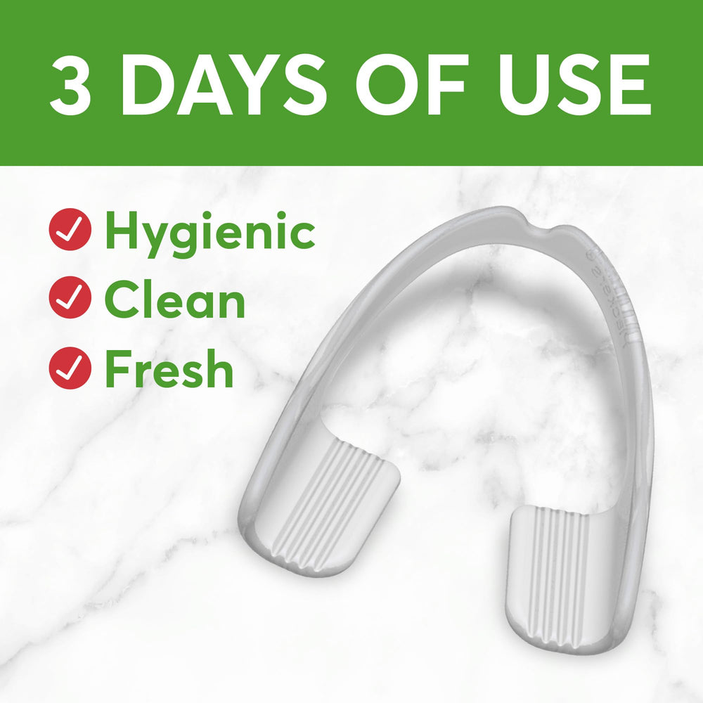 Plackers guard fitted on upper teeth demonstrating comfortable fit
