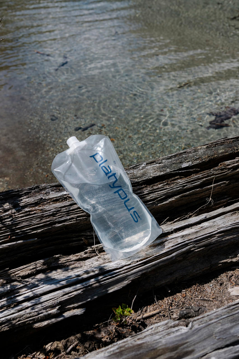 Platypus Platy next to a hand shows scale and lightweight portability for hikers