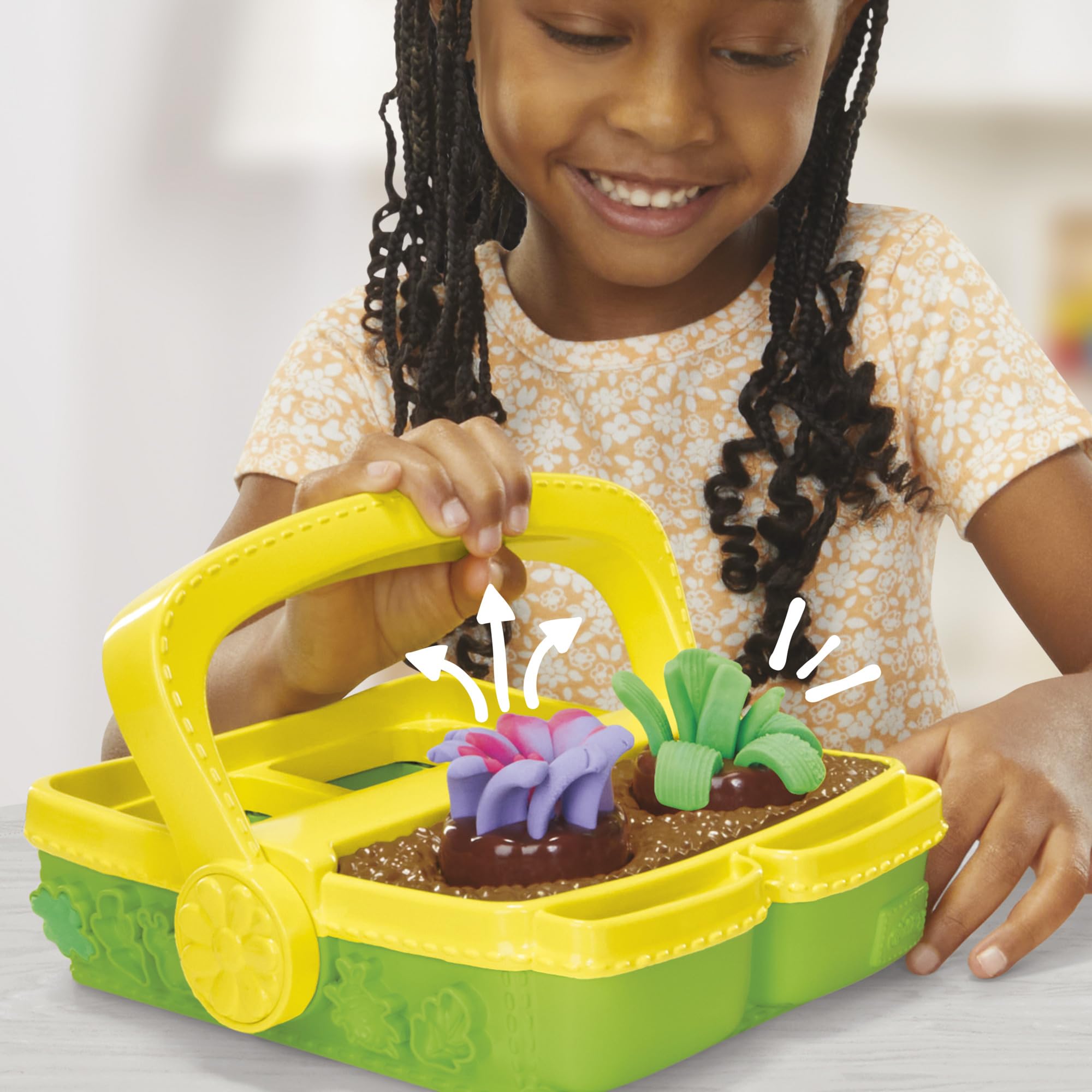 Five Play‑Doh cans displayed showing dual‑color options for vibrant flowers