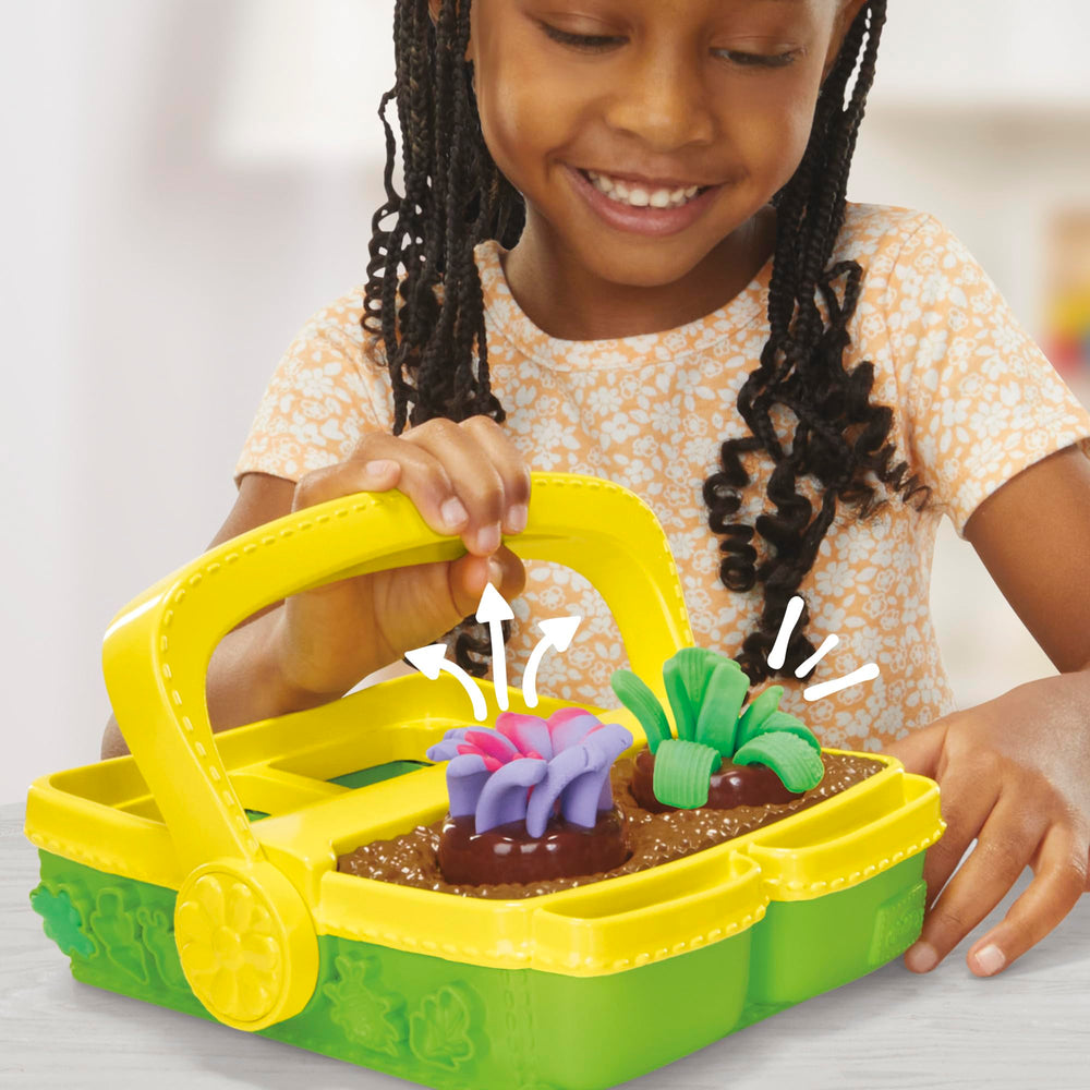 Five Play‑Doh cans displayed showing dual‑color options for vibrant flowers