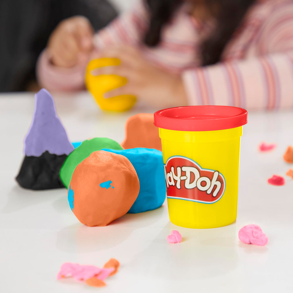 Open Play‑Doh can closeup revealing soft texture ready for molding and reuse