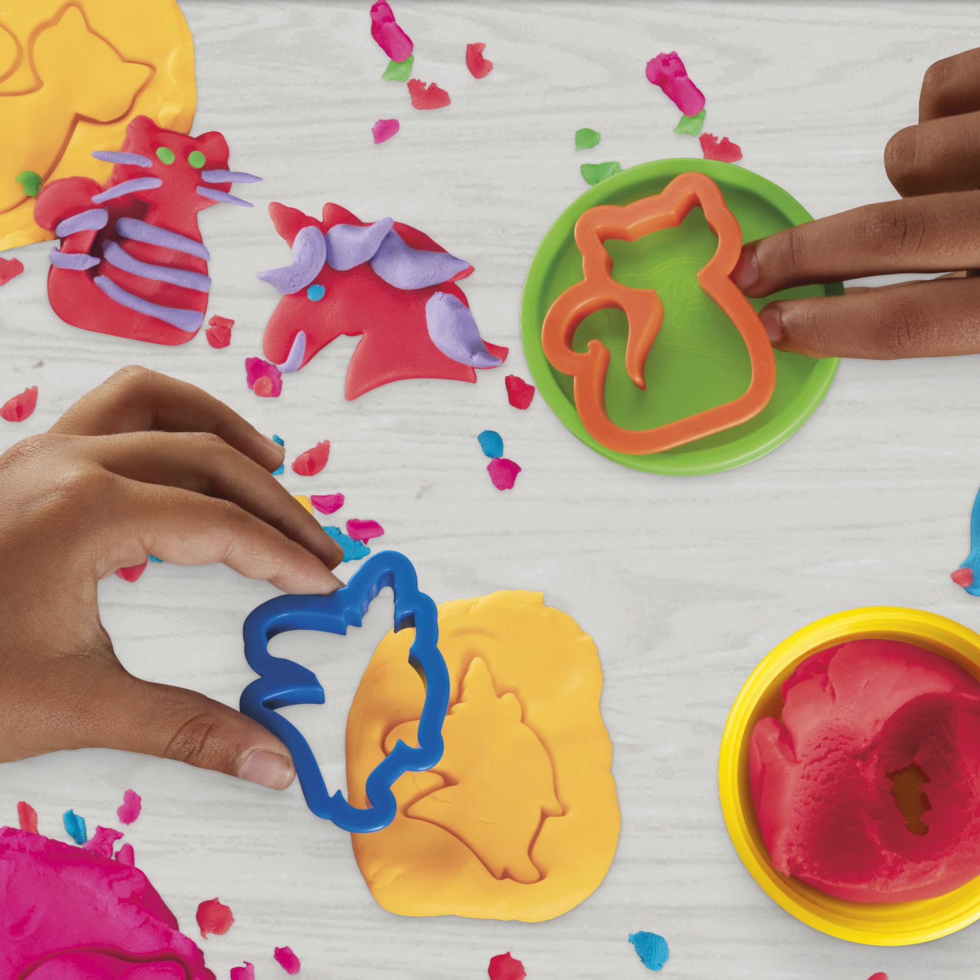 Play-Doh size scale next to a ruler illustrating compact 2-ounce can