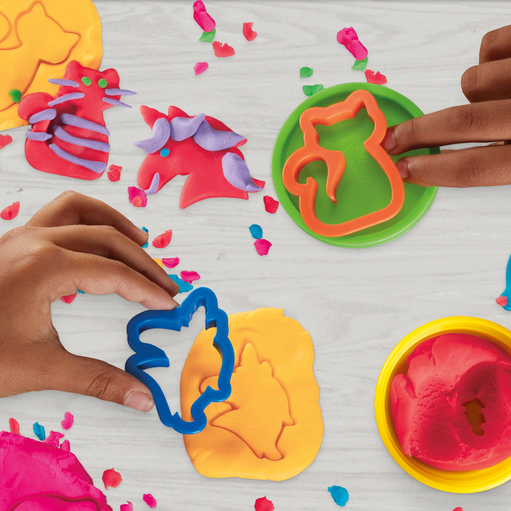Play-Doh size scale next to a ruler illustrating compact 2-ounce can