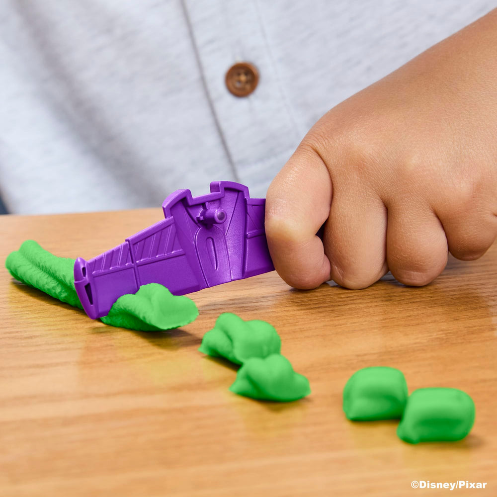 Play-Doh texture press creating faux exhaust for tactile sensory play