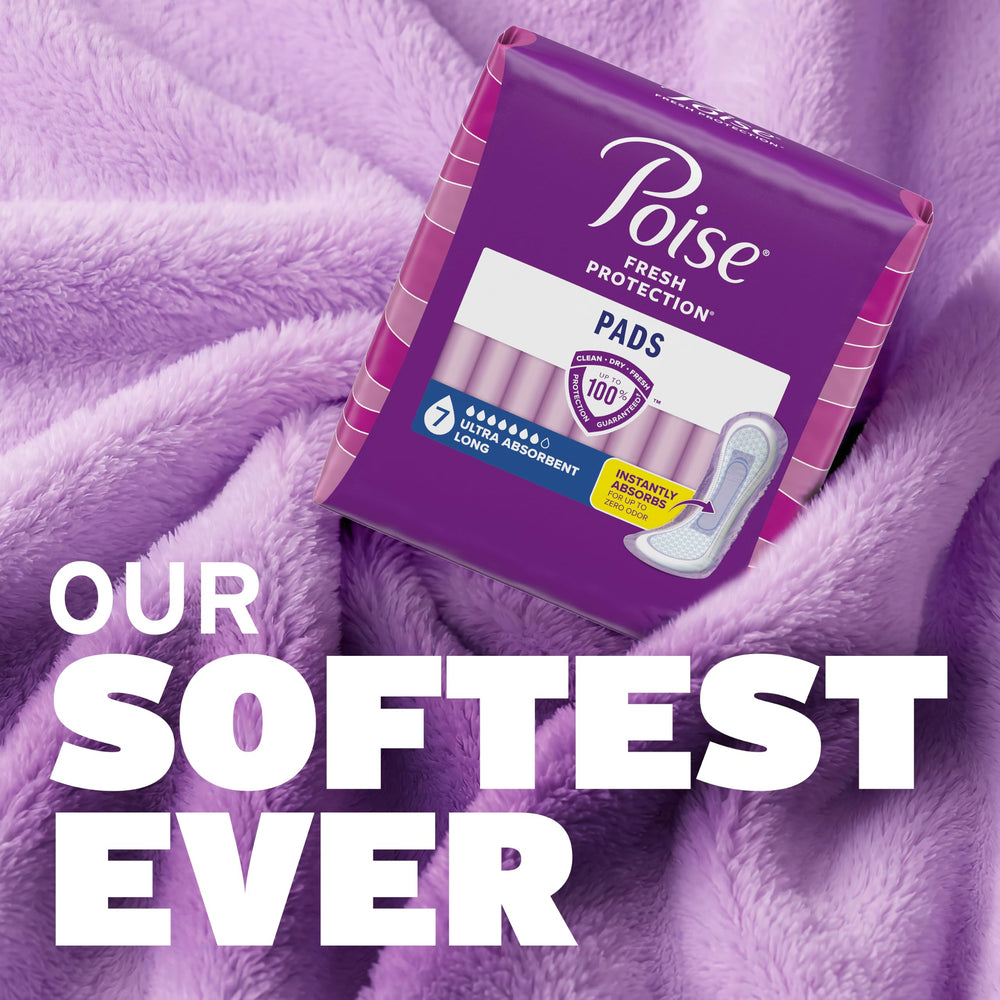 Poise pad next to hand for scale showing long length and comfort