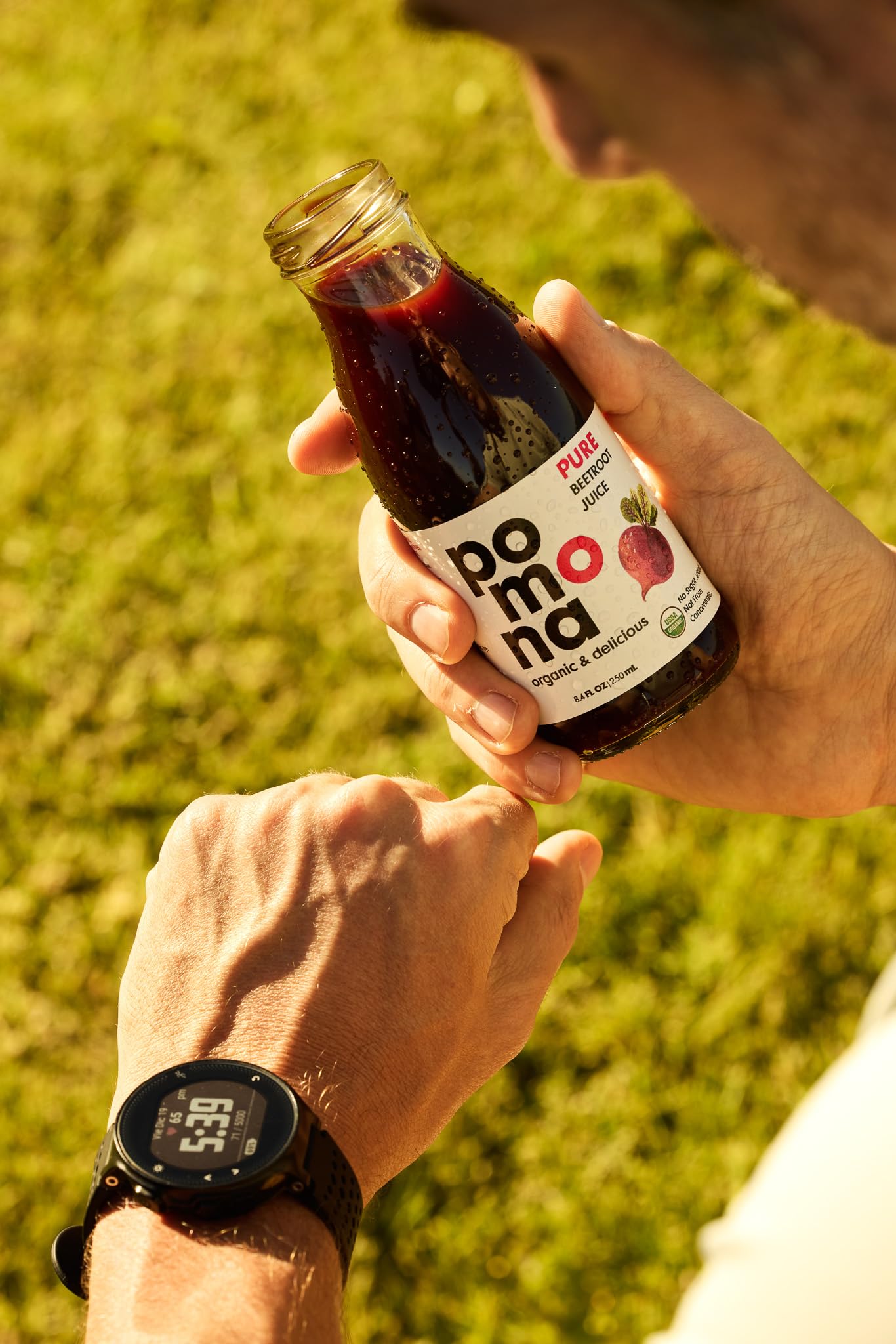 Pomona Organic pour into a glass showing deep beet color and vibrant freshness