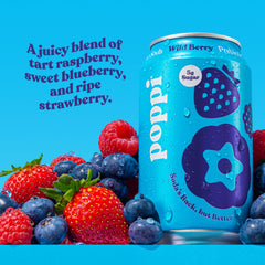poppi Wild Berry pouring into glass with visible bubbles and foam, showing effervescent taste