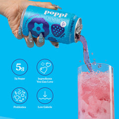 poppi Wild Berry 12-pack in fridge next to fruit for scale, demonstrating convenient stocking
