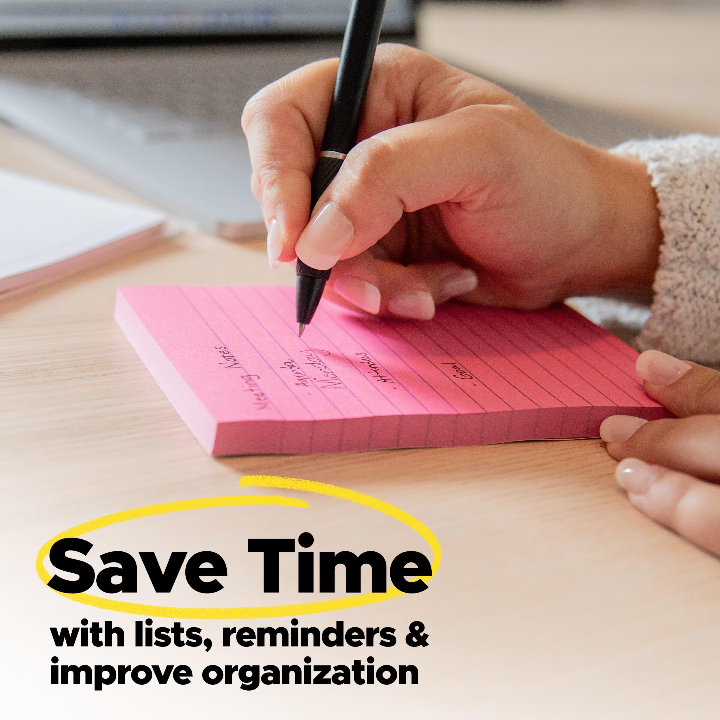 Post-it next to pen showing size scale of 3 by 3 inches for compact convenience benefit
