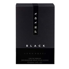 Prada Luna Rossa Black being sprayed on wrist demonstrating controlled application