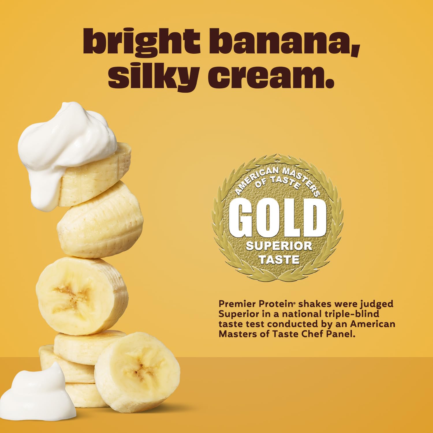 Premier Protein bottle next to fresh bananas and blender for smoothie ideas
